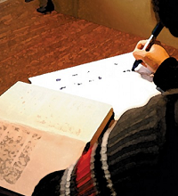 A boy completes his homework